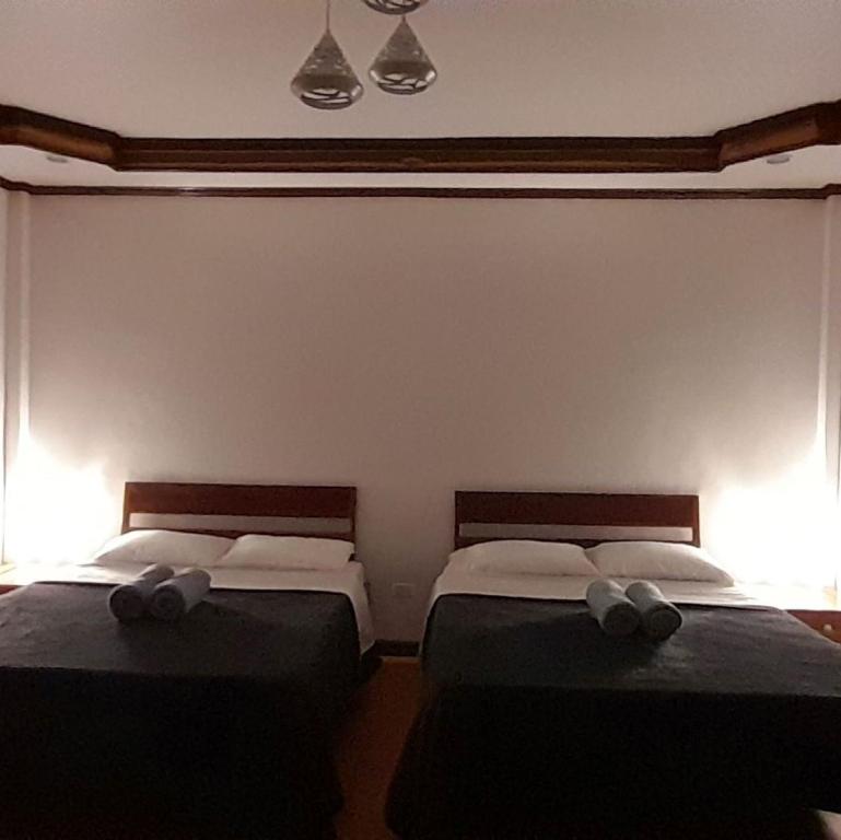 Postel nebo postele na pokoji v ubytování Takbo Beach Resort