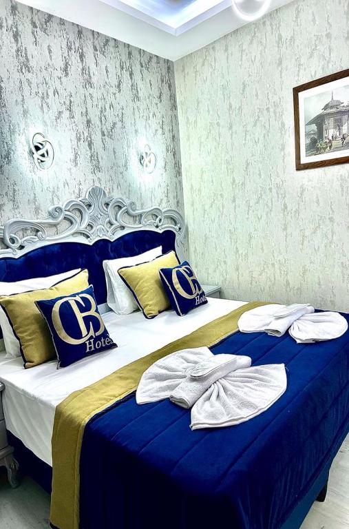 Postel nebo postele na pokoji v ubytování BALPETEK HOTEL