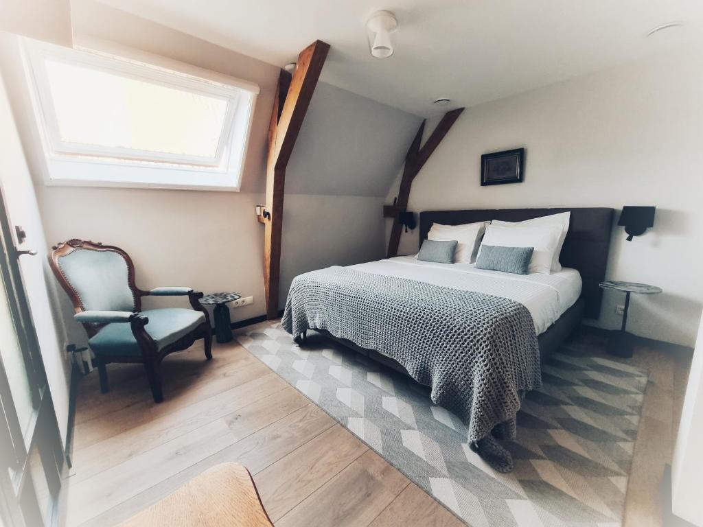 Postel nebo postele na pokoji v ubytování Elf bed and breakfast