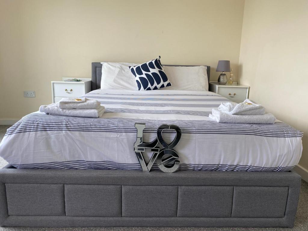 a pair of scissors sitting on top of a bed at My room in Edinburgh