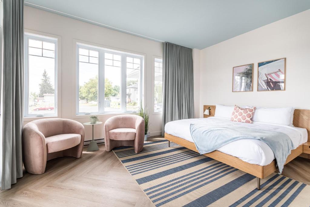 Postel nebo postele na pokoji v ubytování Hôtel le Rosay