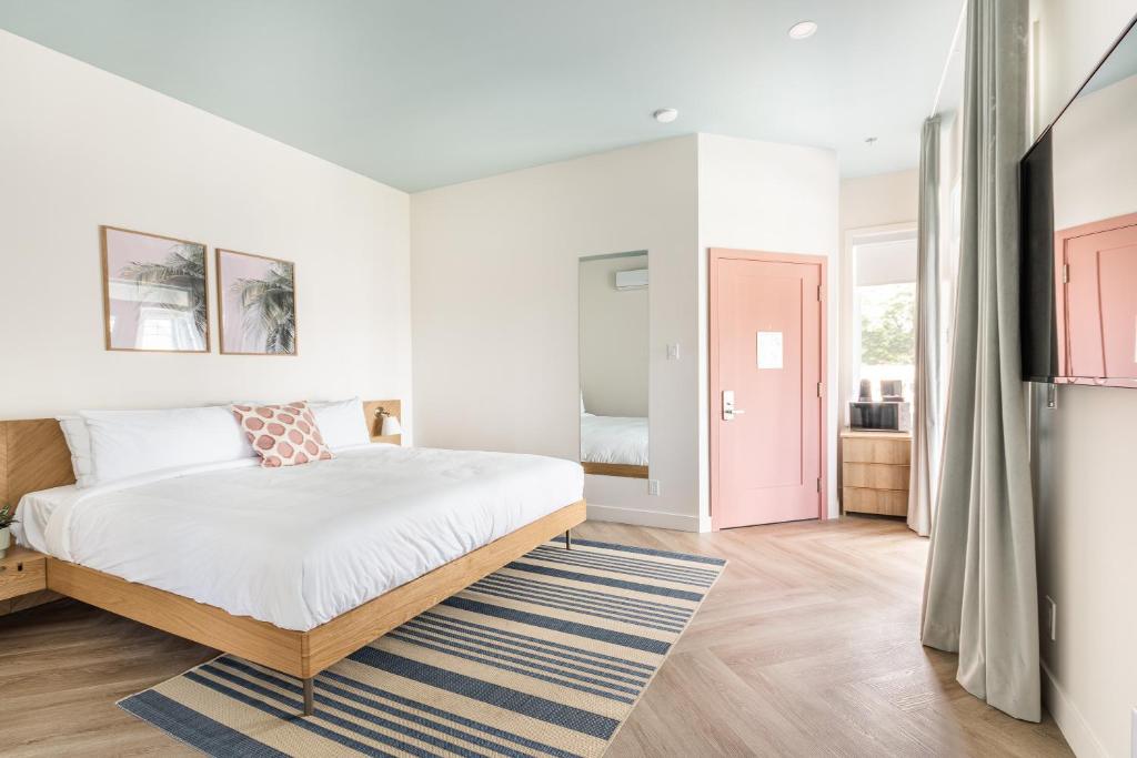 Postel nebo postele na pokoji v ubytování Hôtel le Rosay