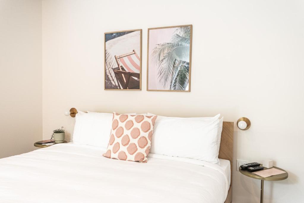 Postel nebo postele na pokoji v ubytování Hôtel le Rosay