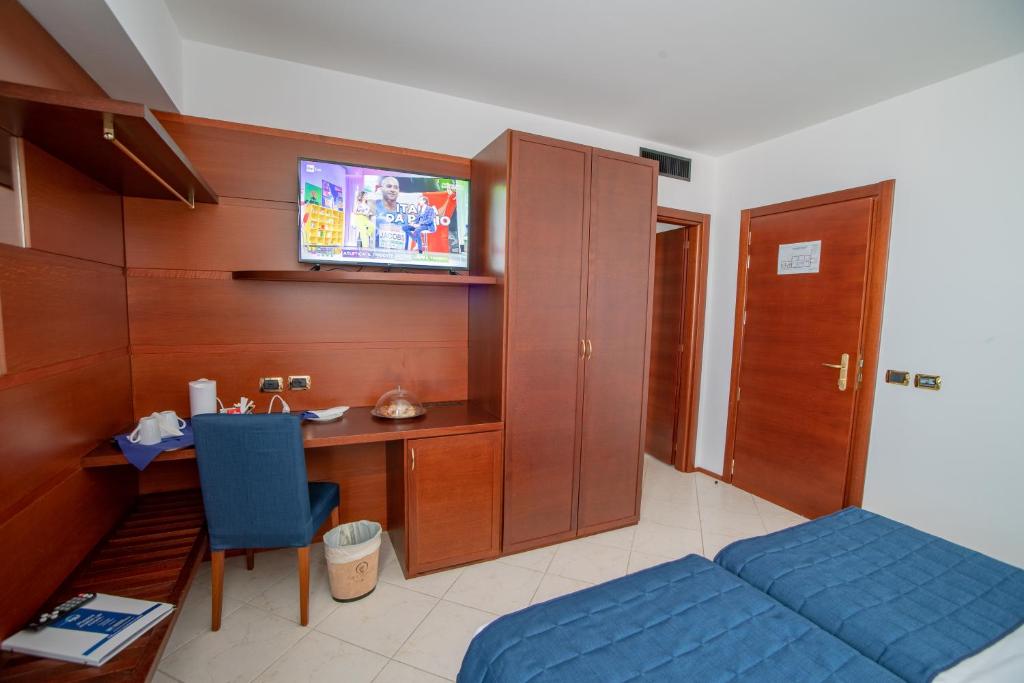 TV a/nebo společenská místnost v ubytování Best Western Hotel Nettuno