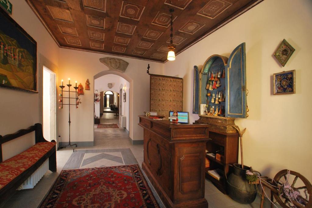 Ένα ή περισσότερα κρεβάτια σε δωμάτιο στο Hotel Le Torri