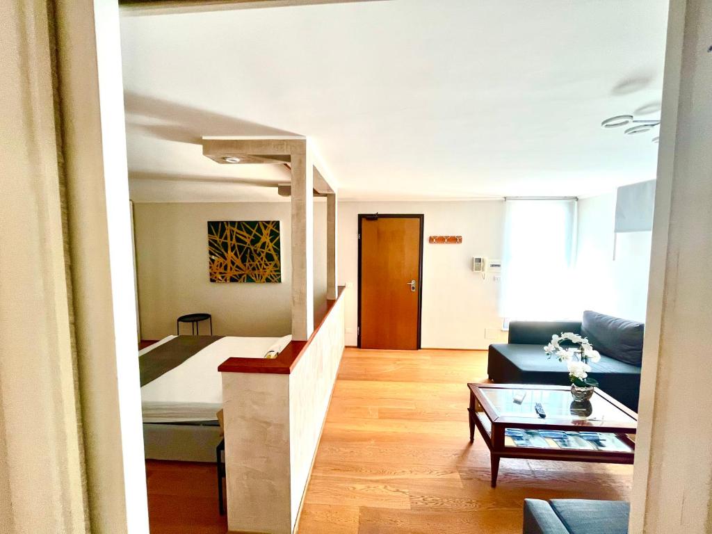 Letto o letti in una camera di Oderisi Studio Suite