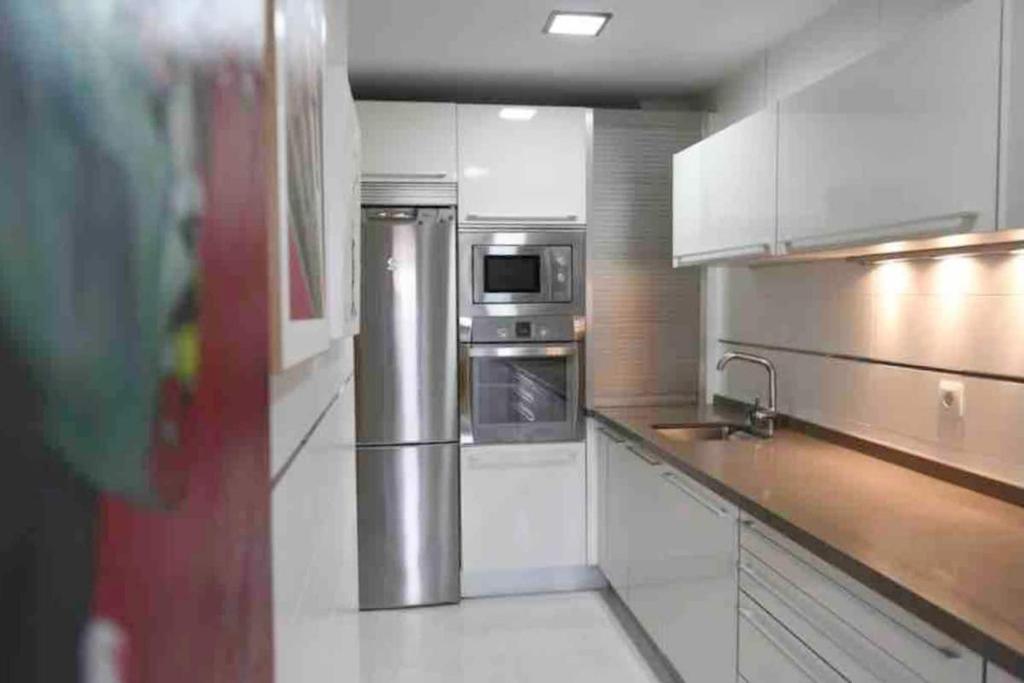 Fotografia z galérie ubytovania Apartamento precioso, Primera línea playa, Netflix, garaje, Wifi, Piscina,Vistas mar v destinácii Roquetas de Mar