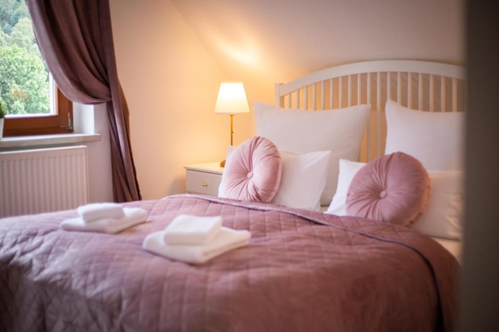 Postel nebo postele na pokoji v ubytování ApartOne Land-Hotel