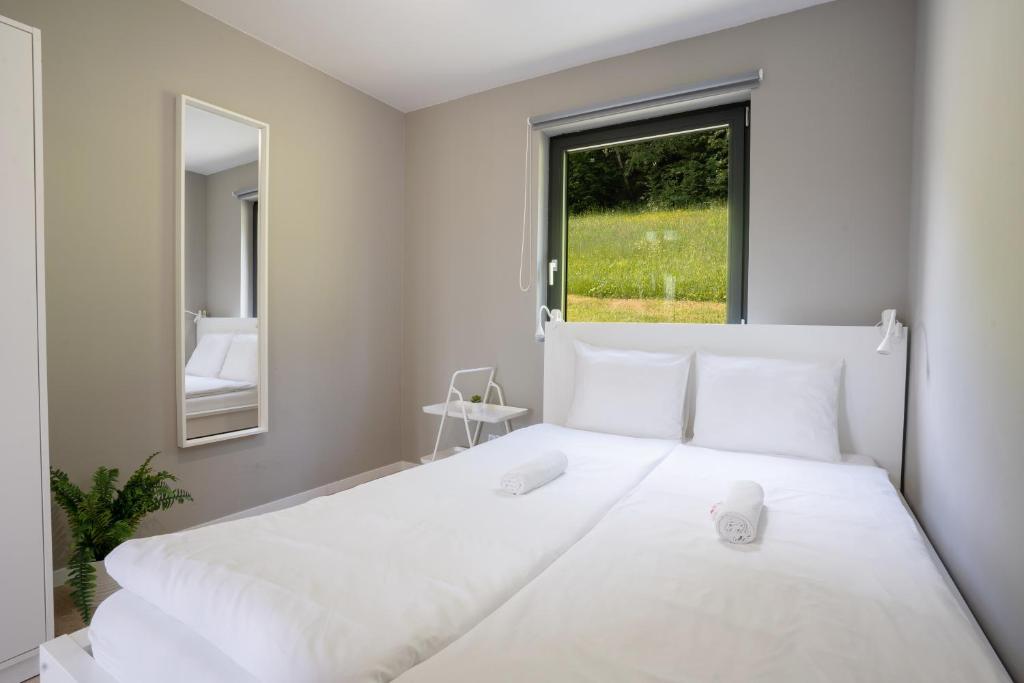 Postel nebo postele na pokoji v ubytování Cozy House