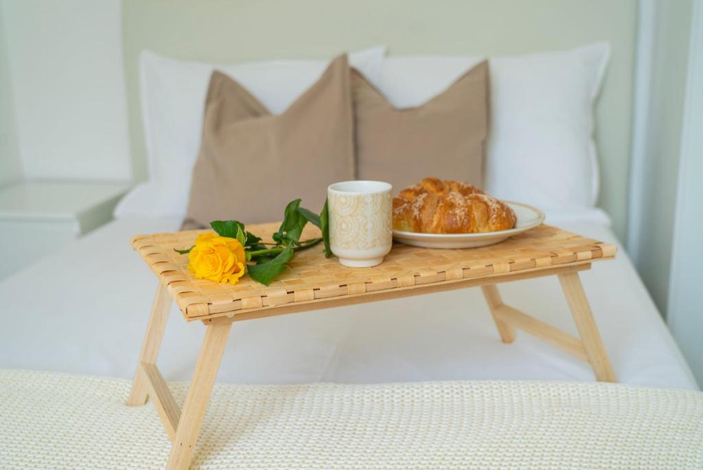 Postel nebo postele na pokoji v ubytování NAGI Lake Como Apartment