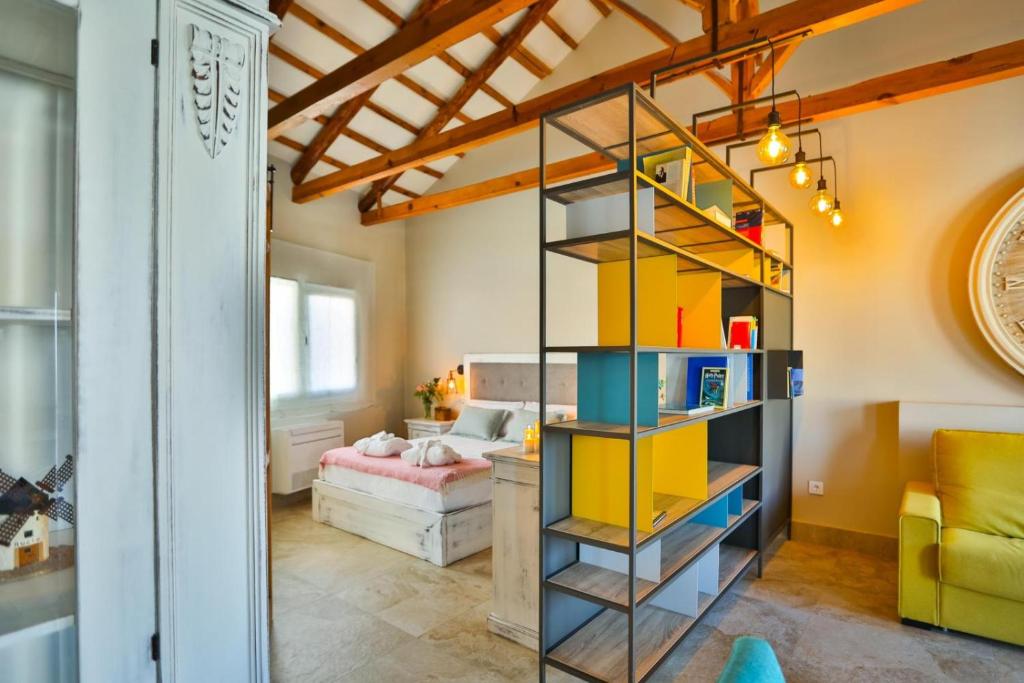 Postel nebo postele na pokoji v ubytování El Patio de los Jazmines Boutique-House