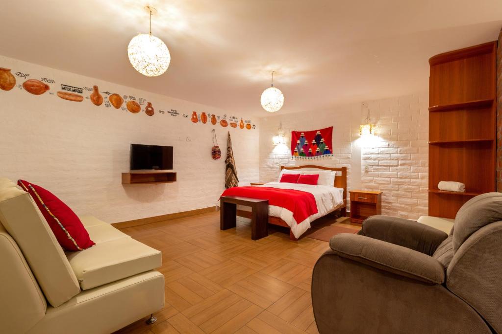 Postel nebo postele na pokoji v ubytování La Floresta Hotel
