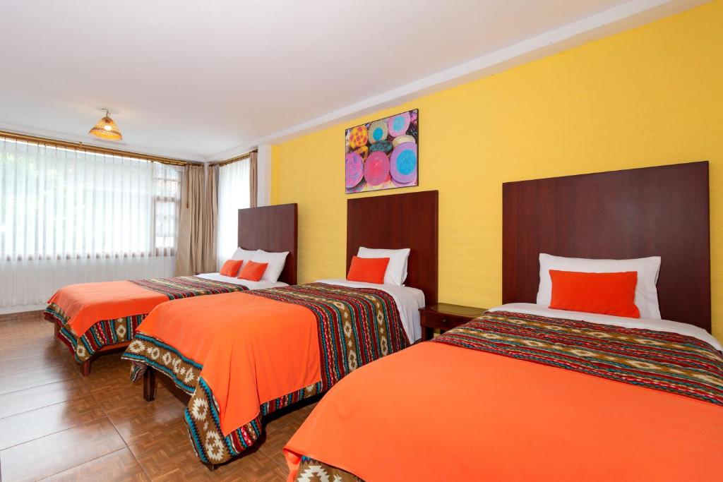 Postel nebo postele na pokoji v ubytování La Floresta Hotel