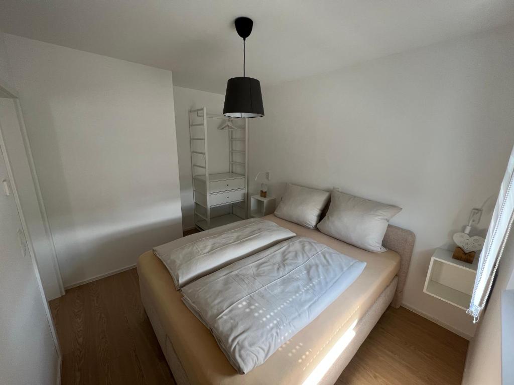 Postel nebo postele na pokoji v ubytování Black Forest Apartments