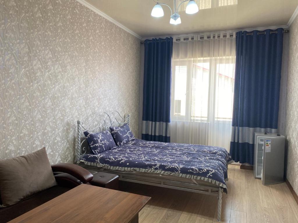 Postel nebo postele na pokoji v ubytování Asem Guest House