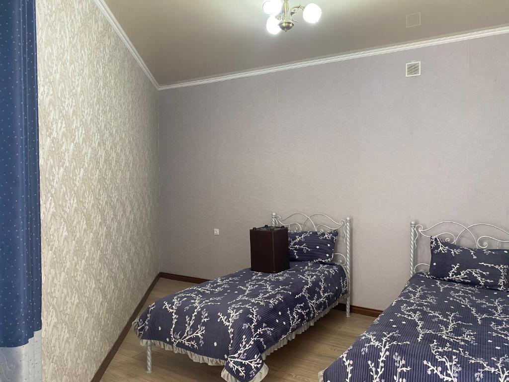 Postel nebo postele na pokoji v ubytování Asem Guest House