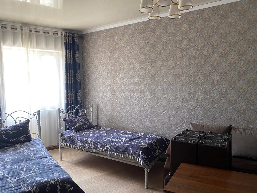 Postel nebo postele na pokoji v ubytování Asem Guest House