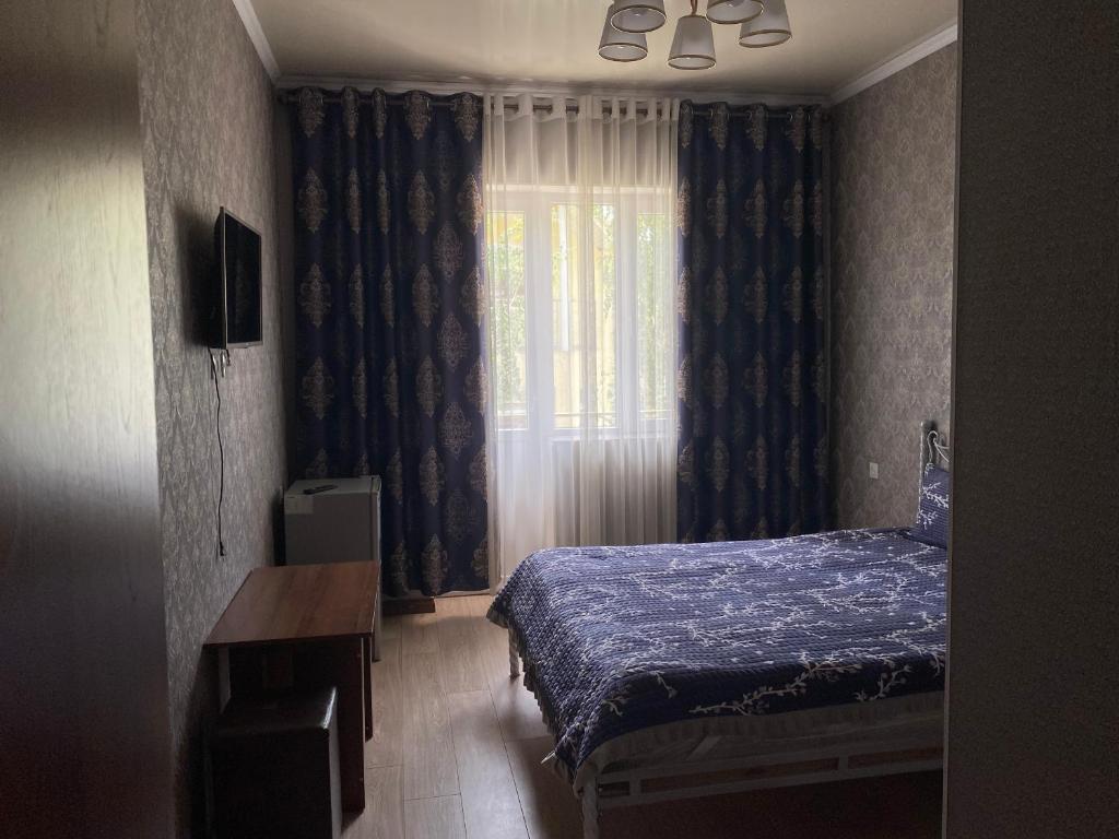 Postel nebo postele na pokoji v ubytování Asem Guest House