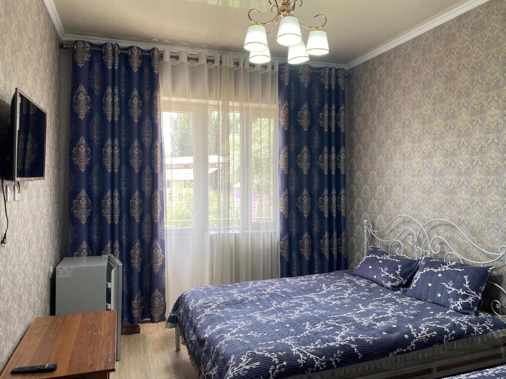 Postel nebo postele na pokoji v ubytování Asem Guest House