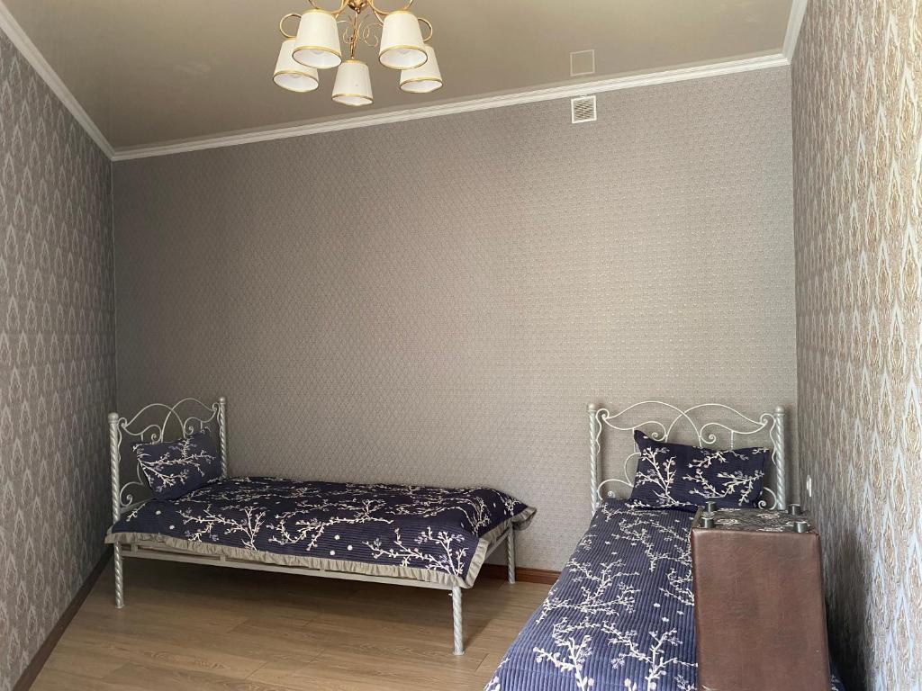 Postel nebo postele na pokoji v ubytování Asem Guest House