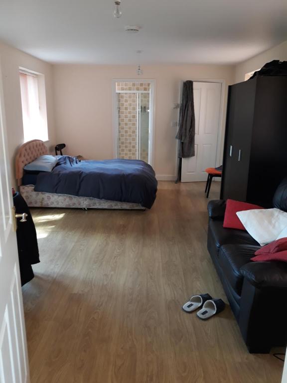 Postel nebo postele na pokoji v ubytování Garden Cottage