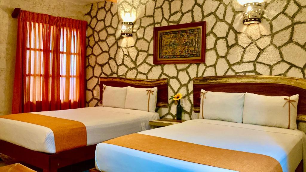 Una cama o camas en una habitación de Casa San Juan