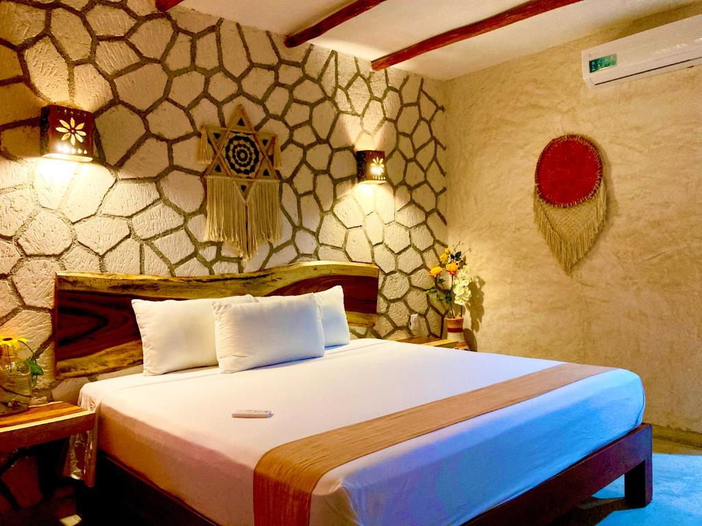 Una cama o camas en una habitación de Casa San Juan