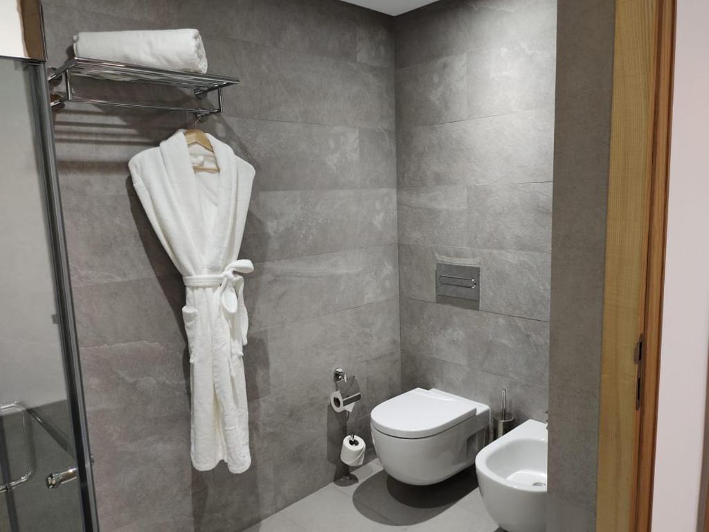 a bathroom with a toilet and a sink at Valley Boutique Hotel in Safi