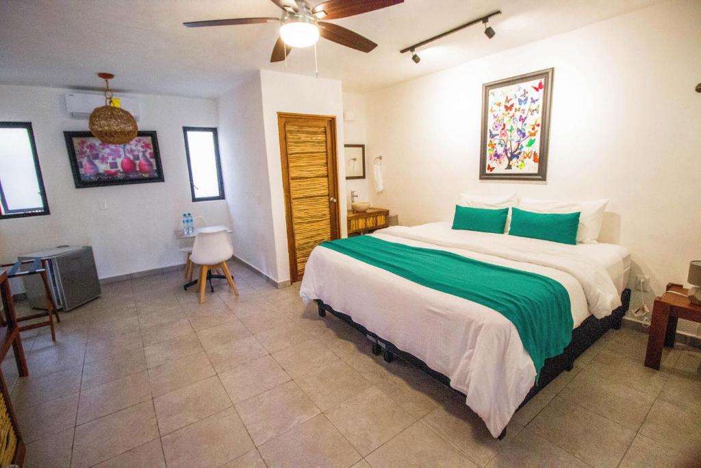 Postel nebo postele na pokoji v ubytování Hotel Tequila Cancun