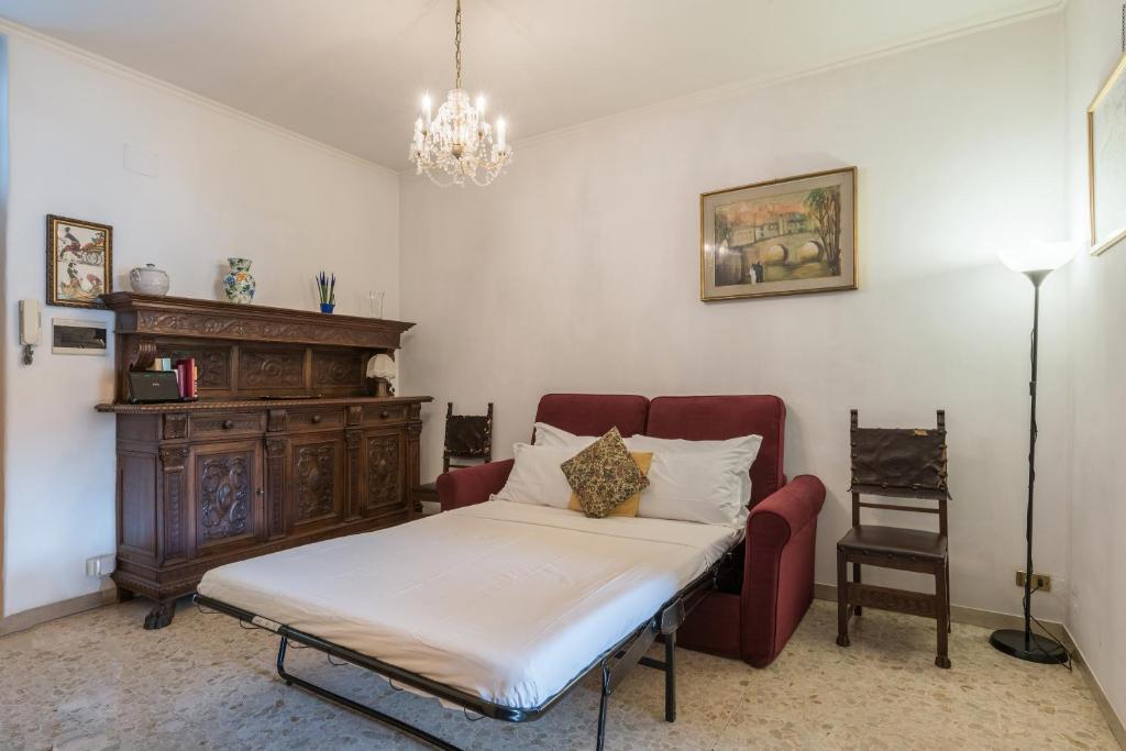 Letto o letti in una camera di Warm apt in ancient building in Vatican-P S Pietro