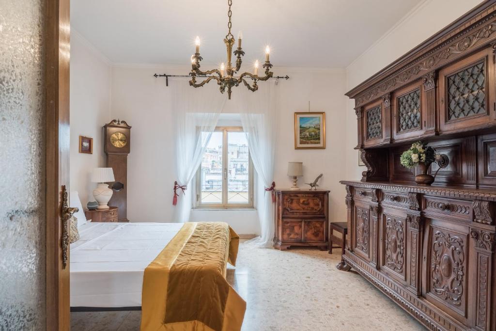 Letto o letti in una camera di Warm apt in ancient building in Vatican-P S Pietro