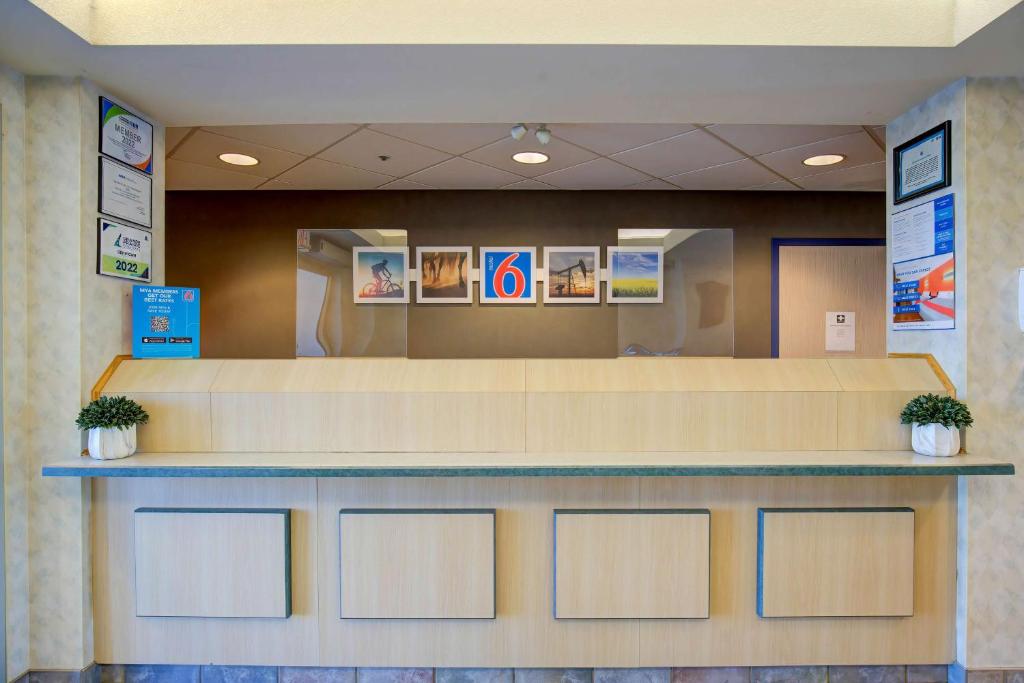 a waiting room with a counter in a hospital at Motel 6-Grande Prairie, AB in Grande Prairie