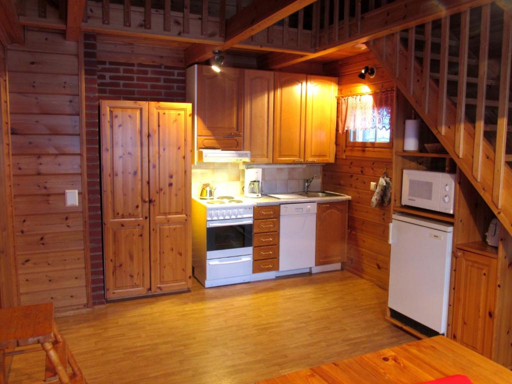 Kuchyň nebo kuchyňský kout v ubytování Ounasloma Holiday Cottages