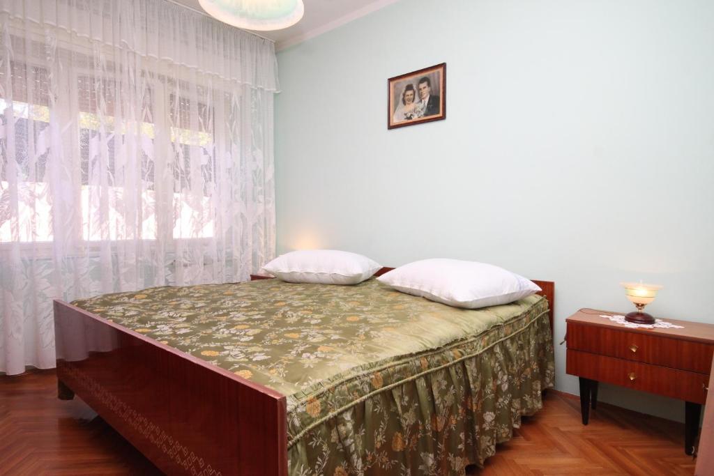 Posteľ alebo postele v izbe v ubytovaní Apartments with a parking space Umag - 7066