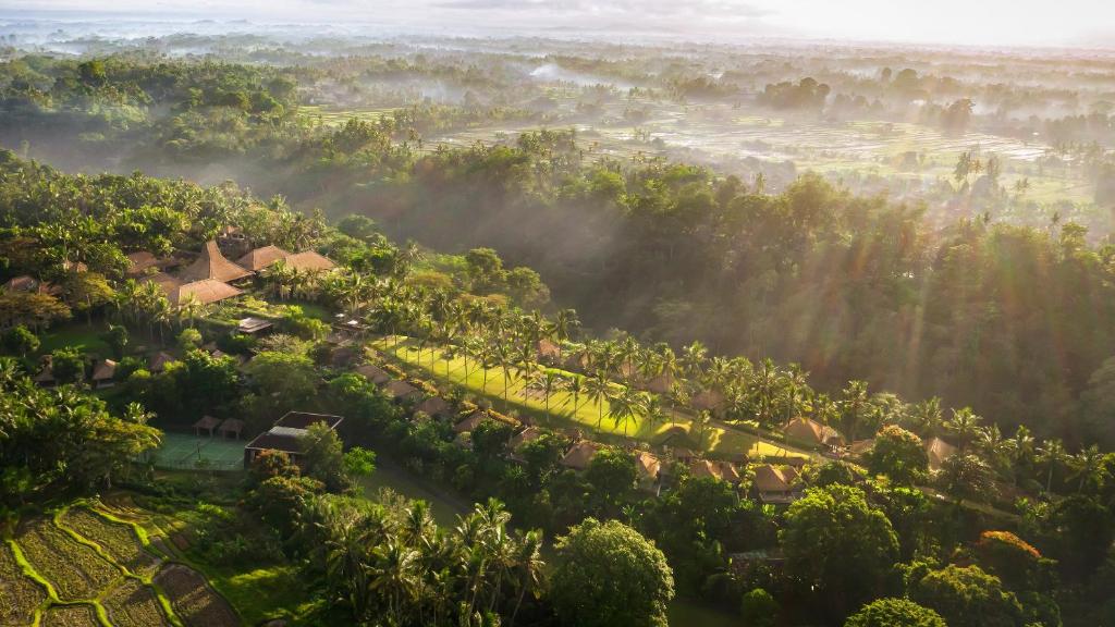 an aerial view of a village in the forest at Maya Ubud Resort & Spa in Ubud
