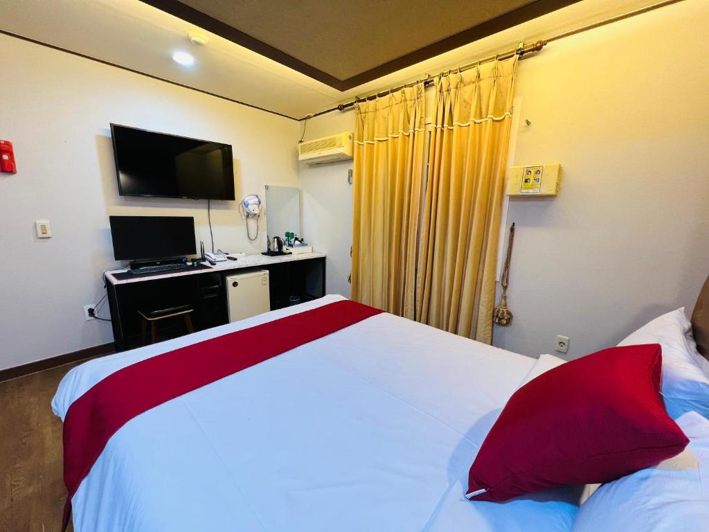 Postel nebo postele na pokoji v ubytování Sweet Hotel