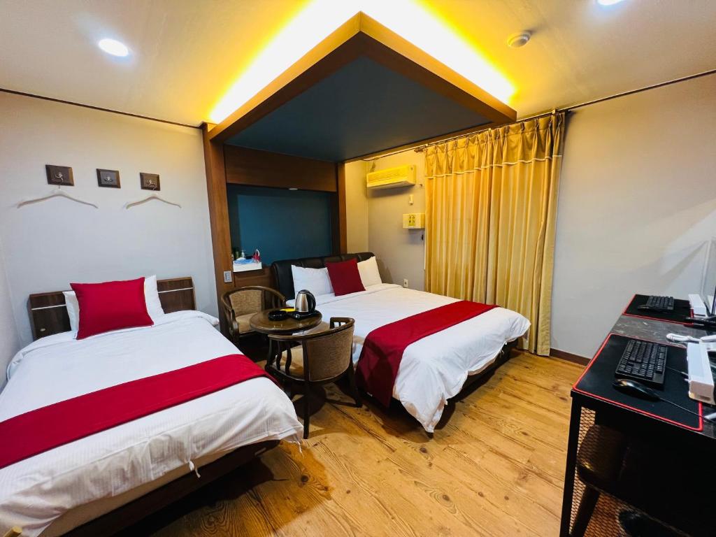 Postel nebo postele na pokoji v ubytování Sweet Hotel