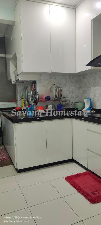 Kuchyň nebo kuchyňský kout v ubytování S PICE Arena Homestay