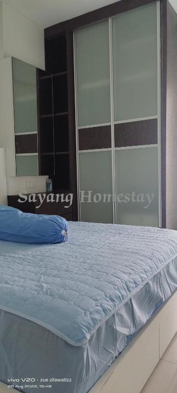 Postel nebo postele na pokoji v ubytování S PICE Arena Homestay