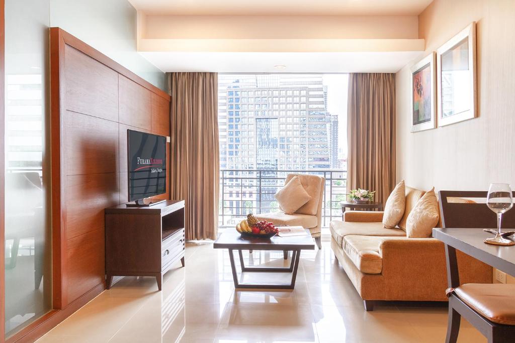 TV a/nebo společenská místnost v ubytování FuramaXclusive Sathorn, Bangkok