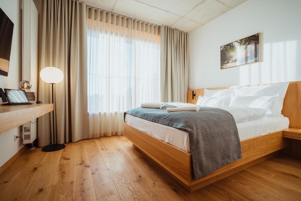 Postel nebo postele na pokoji v ubytování SeeLoge Eutin
