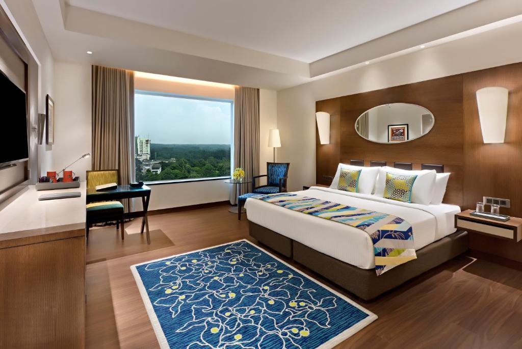 Postel nebo postele na pokoji v ubytování Fortune Park Pushpanjali, Durgapur - Member ITC Hotels' Group