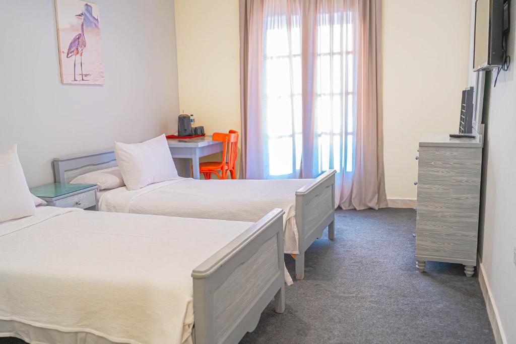 Postel nebo postele na pokoji v ubytování فندق الشاطئ رأس البر-Beach Hotel Ras Elbar