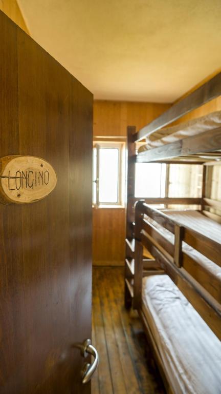 Postel nebo postele na pokoji v ubytování Rifugio Chierego - 1911m