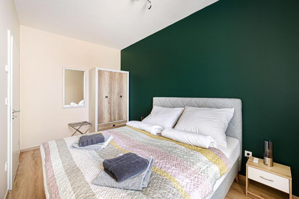 Posteľ alebo postele v izbe v ubytovaní Westside Inn