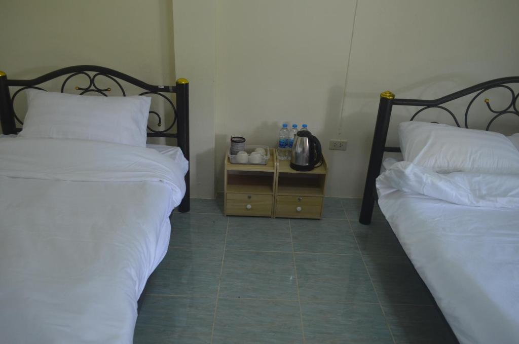 Postel nebo postele na pokoji v ubytování Phulomnum Resort