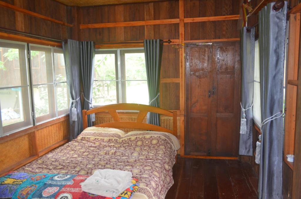 Postel nebo postele na pokoji v ubytování Phulomnum Resort
