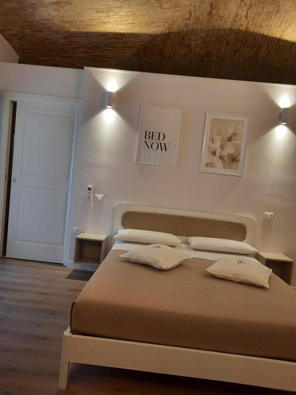 Postel nebo postele na pokoji v ubytování Dimora Donna Dora - Albergo Diffuso