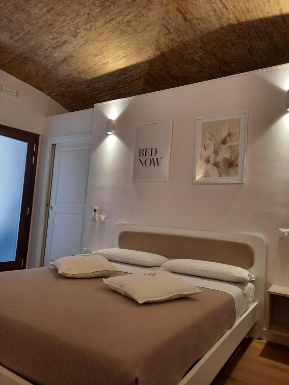 Postel nebo postele na pokoji v ubytování Dimora Donna Dora - Albergo Diffuso