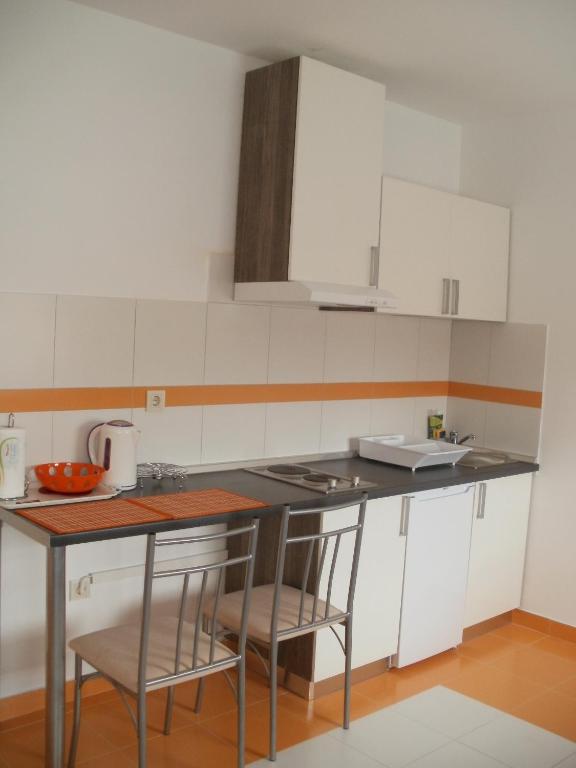 Kuchyň nebo kuchyňský kout v ubytování Apartments with parking spaces Fazana - 7234